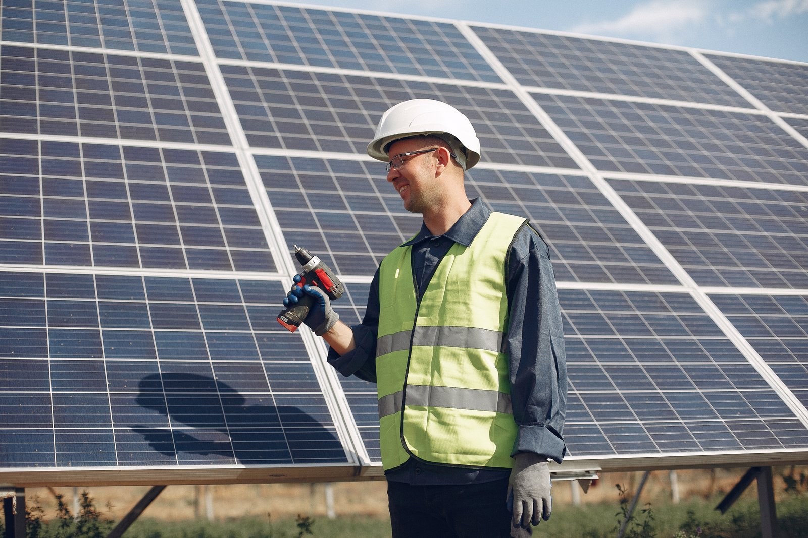 Energy Auditor inspecting solar panels